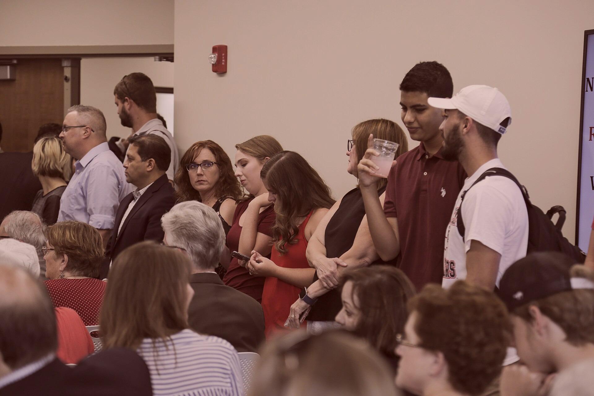 Attendees gather at Goodwin Institute during the Moore Forum 1991, North Kevin, 2021-11-30. Credit: Anna Joyce