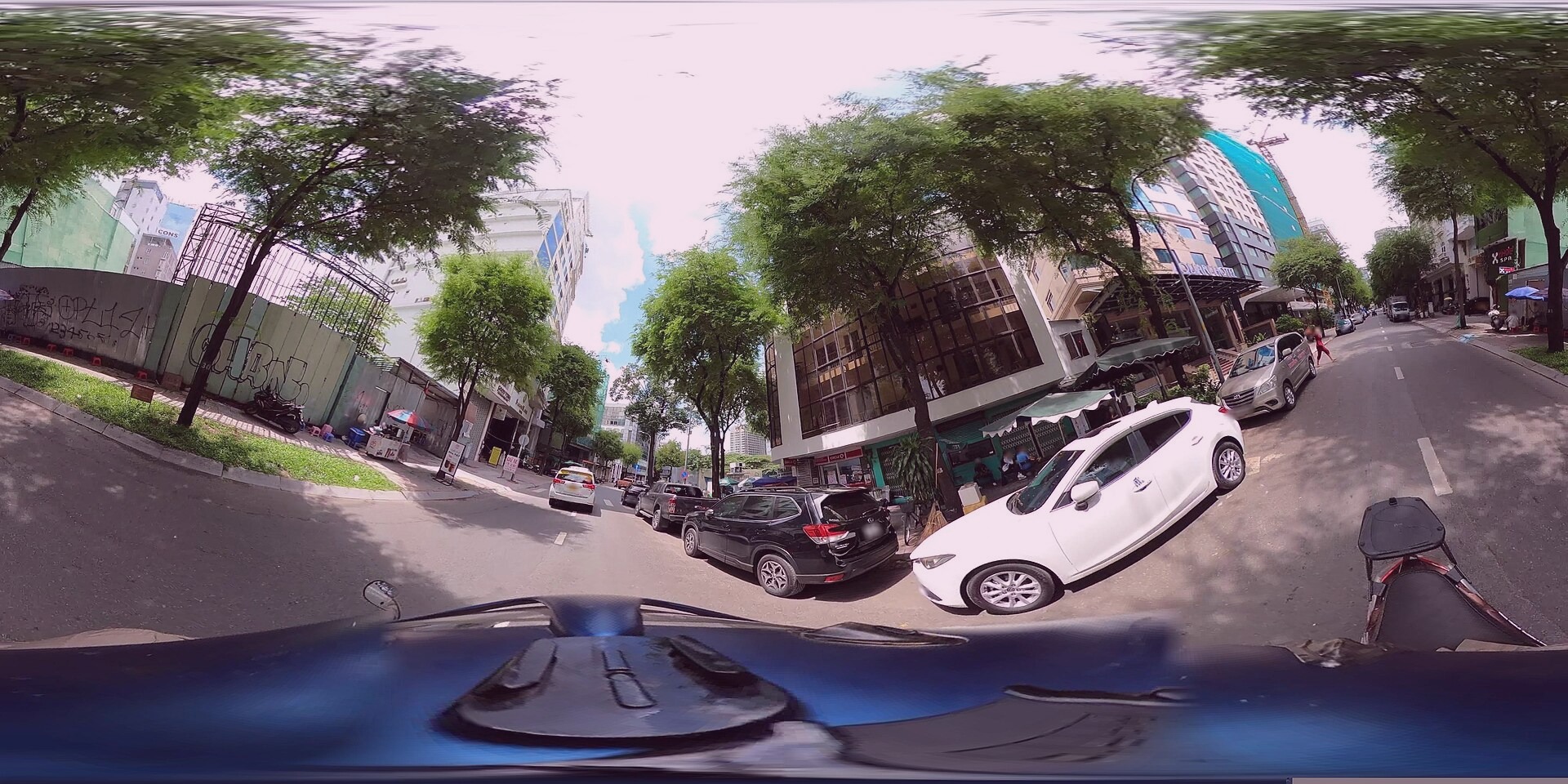A bustling scene near the Williams Tower in Walterside. Captured by Stephanie Brooks on 2022-10-05.