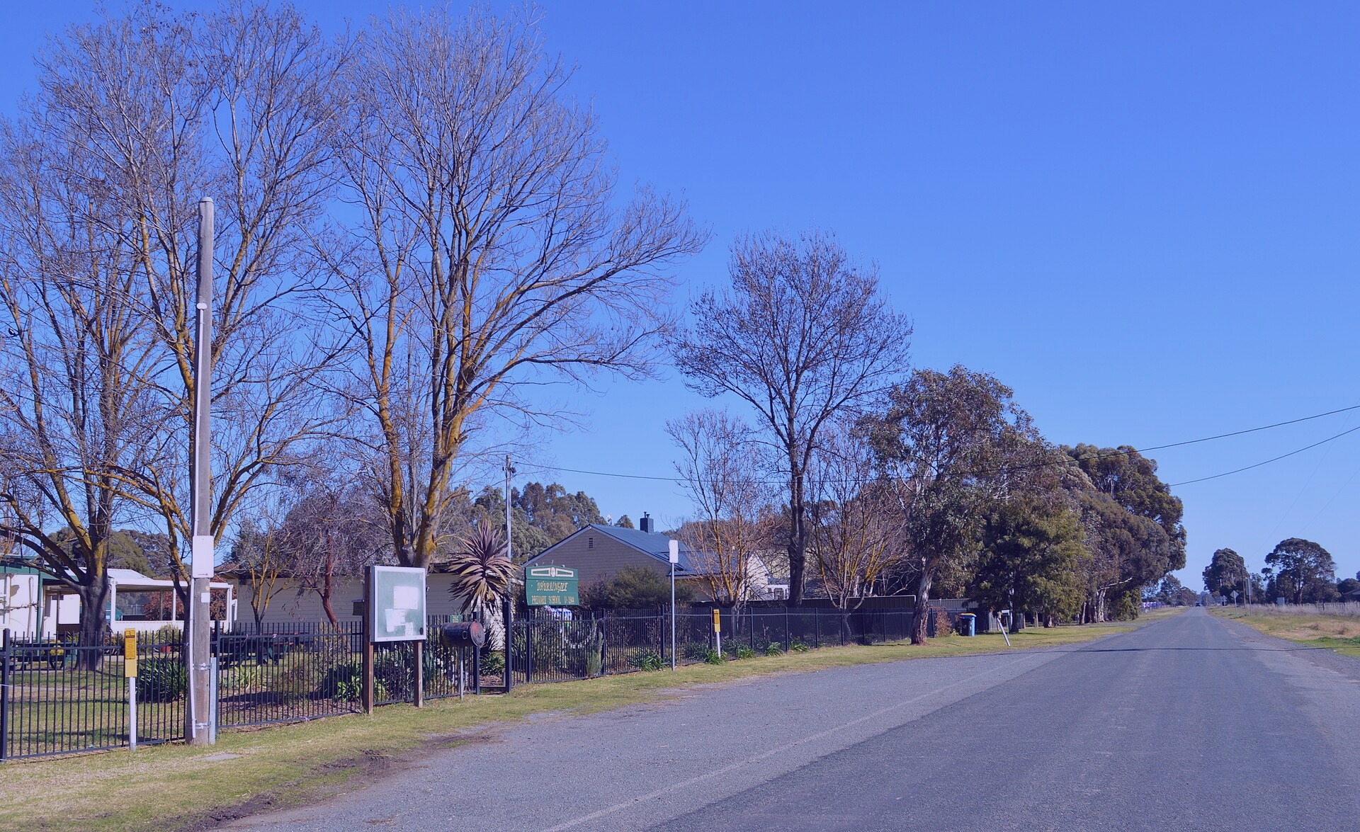 A sunlit scene near the Chen Tower in West Dustin. Captured by Terry Fisher on 2023-04-29.