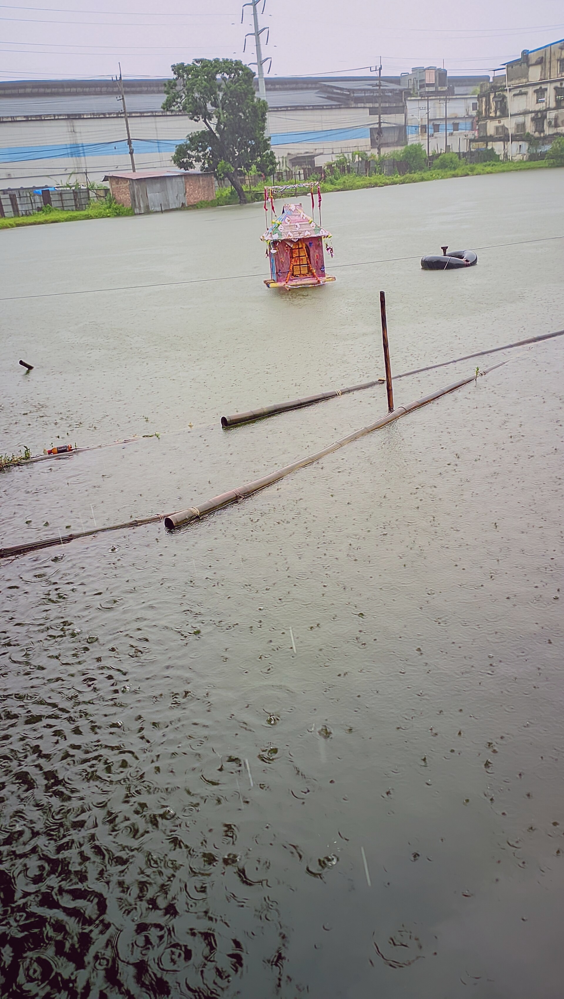 A aerial scene near the Long Tower in Cynthiafort. Captured by Amy Knapp on 2023-06-15.
